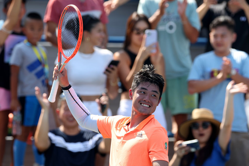 Yibing Wu of China celebrates after defeating Nikoloz Basilashvili of Georgia during the Men's Singles First Round on Day One of the 2022 US Open at USTA Billie Jean King National Tennis Center on August 29, 2022 in New York City. (Photo by Sarah Stier/Getty Images)