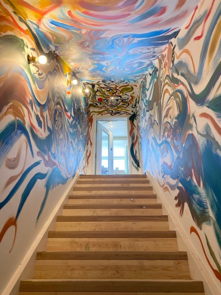 Local artist Sophie Von Hellermann was commissioned to create a mural for the stairway between the bar and the restaurant. Photo: Ed Reeve.
