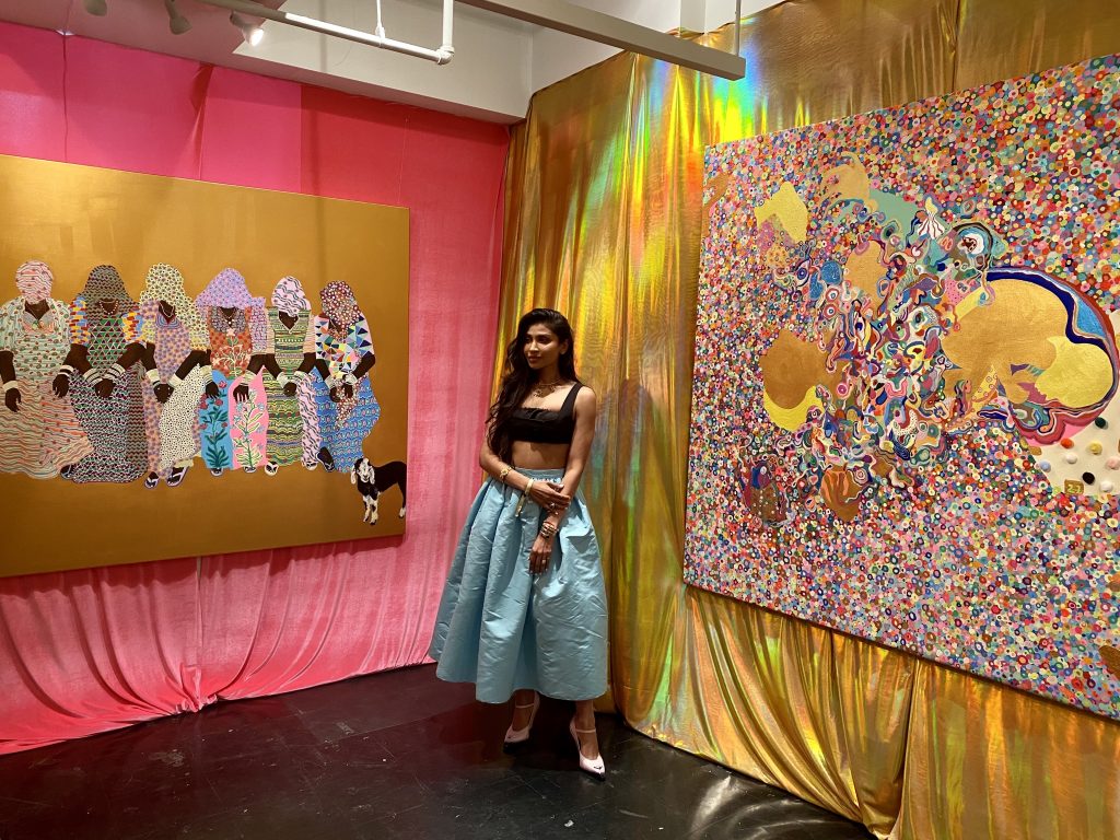 Radhika Gupta-Buckley and her work, curated by IV Gallery, at New York's SPRING/BREAK Art Show 2022. Photo by Sarah Cascone.