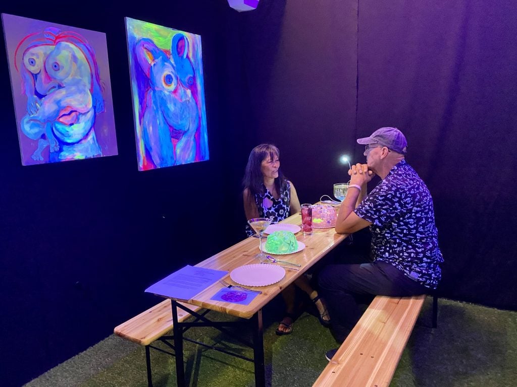 "Psychedelic Picnic" by Brooke mcgowen curated by Heinz Patatzki at New York's SPRING/BREAK Art Show 2022. Photo by Sarah Cascone.