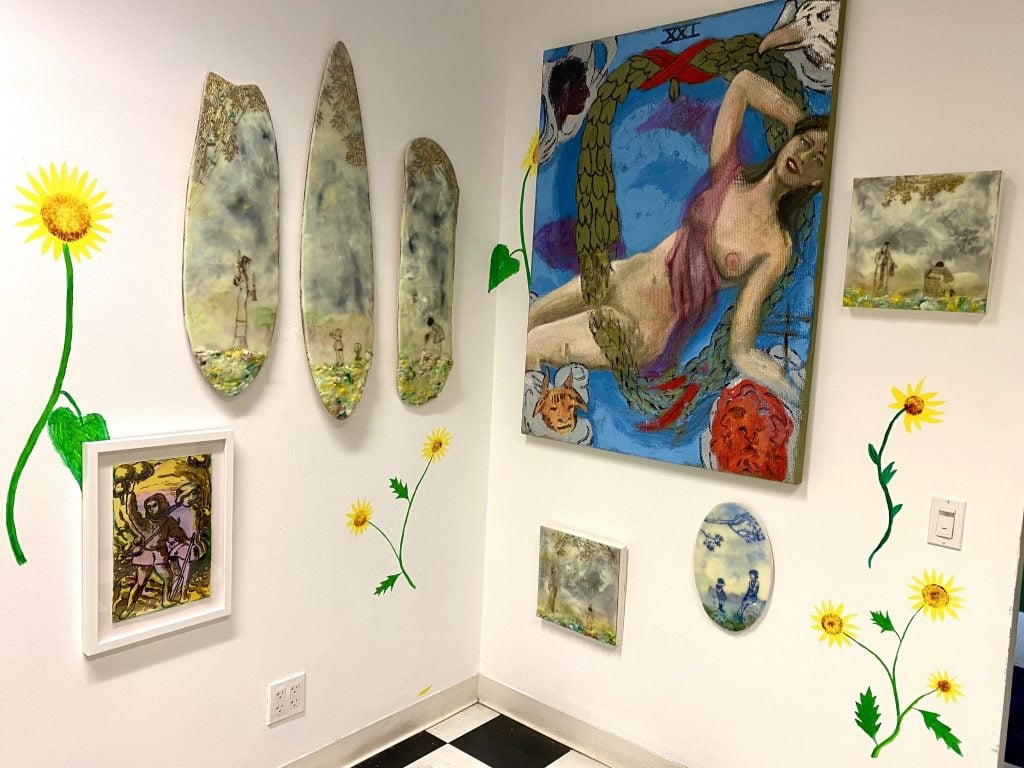 "Dandelion Fork" curated by Olivia Swider featuring artists Delphine Hennelly, Cecile Chong, and Nicholas Cueva at New York's SPRING/BREAK Art Show 2022. Photo by Sarah Cascone. 