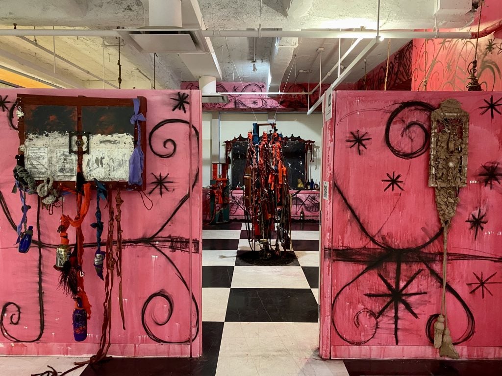 "Symbolism and the Aesthetic Resistance Between Art and Ritual" curated by Rowynn Dumont with art by Xayvier Haughton at New York's SPRING/BREAK Art Show 2022. Photo by Sarah Cascone. 