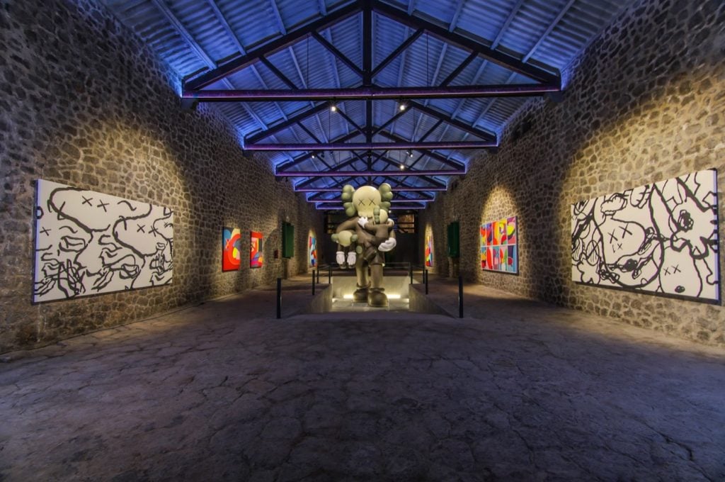 A view of KAWS's installation at the La Nave Salinas Foundation in Ibiza.  Photo by Leo Malka.