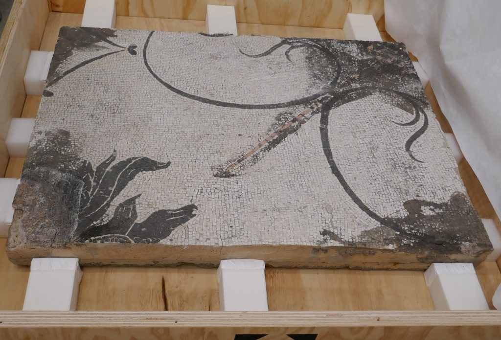 A piece of an ancient Roman mosaic, in storage for decades, was found and returned to Italy, where it will be restored and displayed for the public. Photo courtesy of the FBI. 