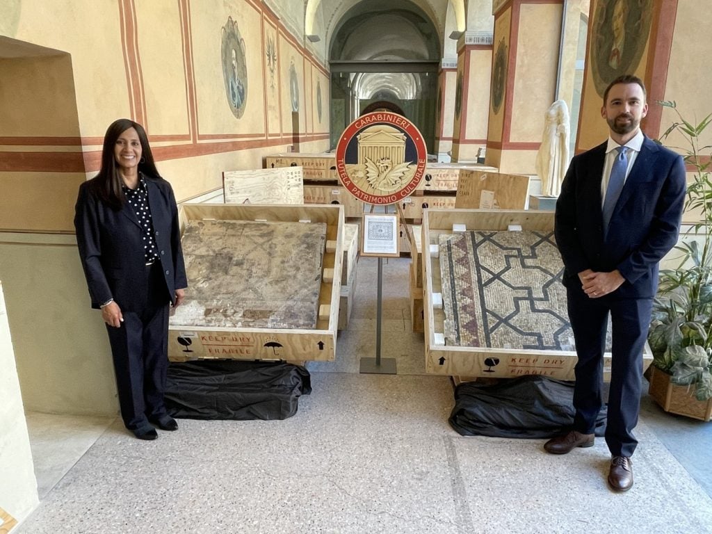 Special Agents Elizabeth Rivas and Allen Grove in Italy for the repatriation of a 2,000-year-old mosaic to its home in Rome. Photo courtesy of the FBI.