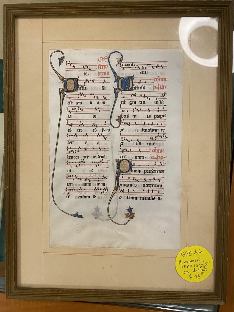 Sideri's framed page of the Beauvais Missal. Photo courtesy of Megan Cook.