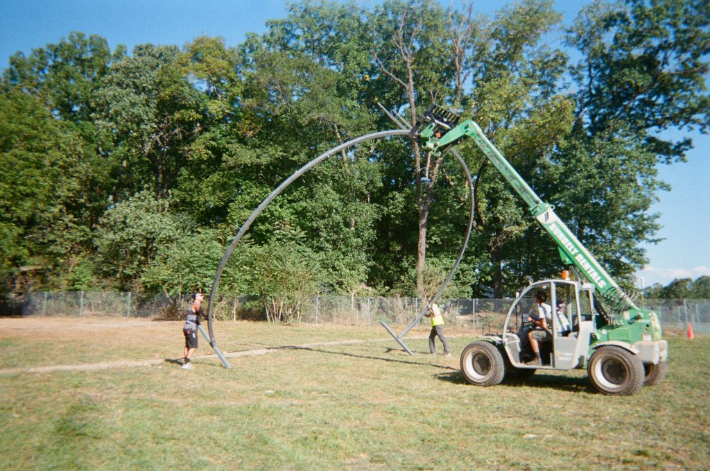 Installing James Tapscott’s Arc Zero installation. He used many different materials (mist, light, water, steel) to create this eclipse-like visual throughout the weekend. Festival goers could cool down in the mist during the hot days, and at night this turned into a kind of portal entrance to assume vivid astro focus’s late-night venue, Smokey’s.