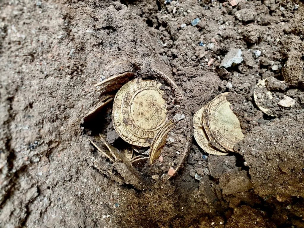 A British couple discovered this hoard of golden coins buried under their kitchen floor. Photo courtesy of Spink and Sons, London. 