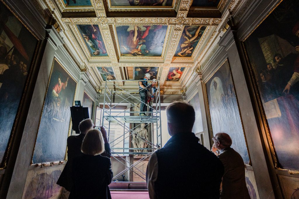 Preparing to remove Artemisia Gentileschi,Allegory of Inclination (1816) from the ceiling of the Casa Buonarroti, Florence. Photo by Olga Makarova, courtesy of the Casa Buonarroti, Florence.