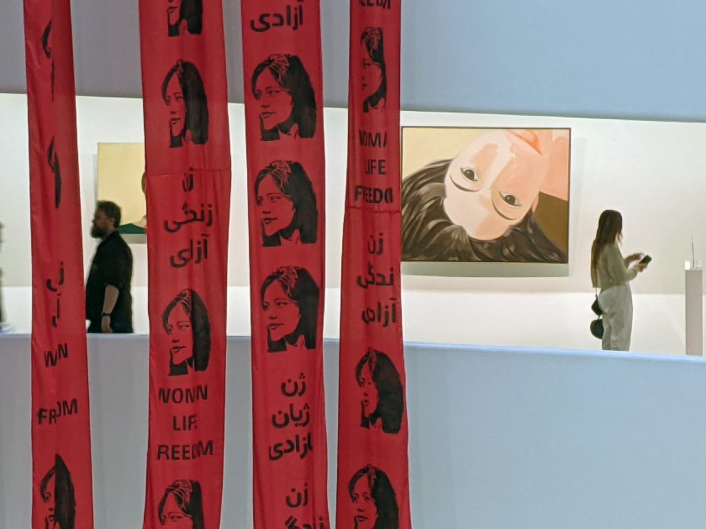 The Anonymous Artist Collective for Iran unfurled banners in the rotunda at New York's Solomon R. Guggenheim Museum in support of the women-led protests in Iran. Photo courtesy of the Anonymous Artist Collective for Iran. 