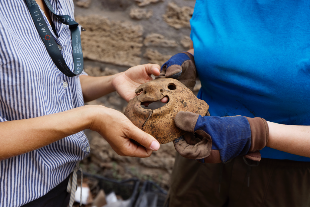 A mask the team found while excavating the kitchen pit. Photo courtesy of Apple. 