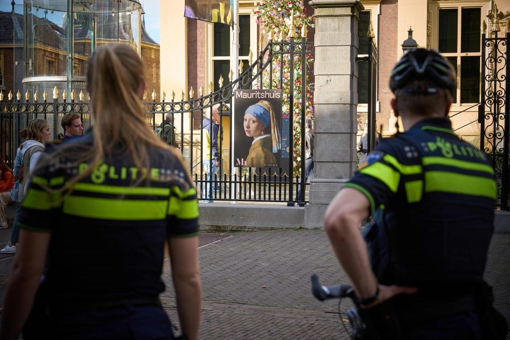 Dutch police arrested climate activists targeting Johannes Vermeer's painting 