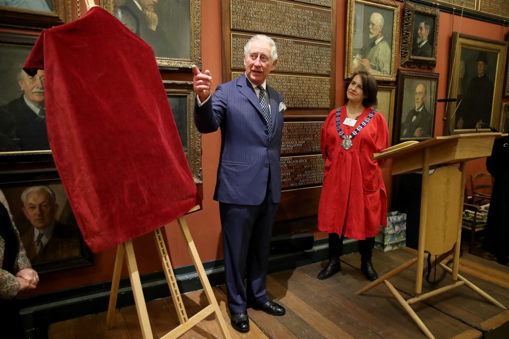 Then-Prince Charles unveiled a commemorative wooden plaque on his visit to the Art Worker's Guild on March 7, 2018 in London, England. (Photo by Chris Jackson - WPA Pool/Getty Images)