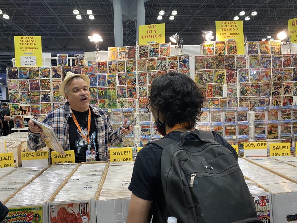 Ruben Miranda selling comics at New York Comic Con. Photo by Sarah Cascone.