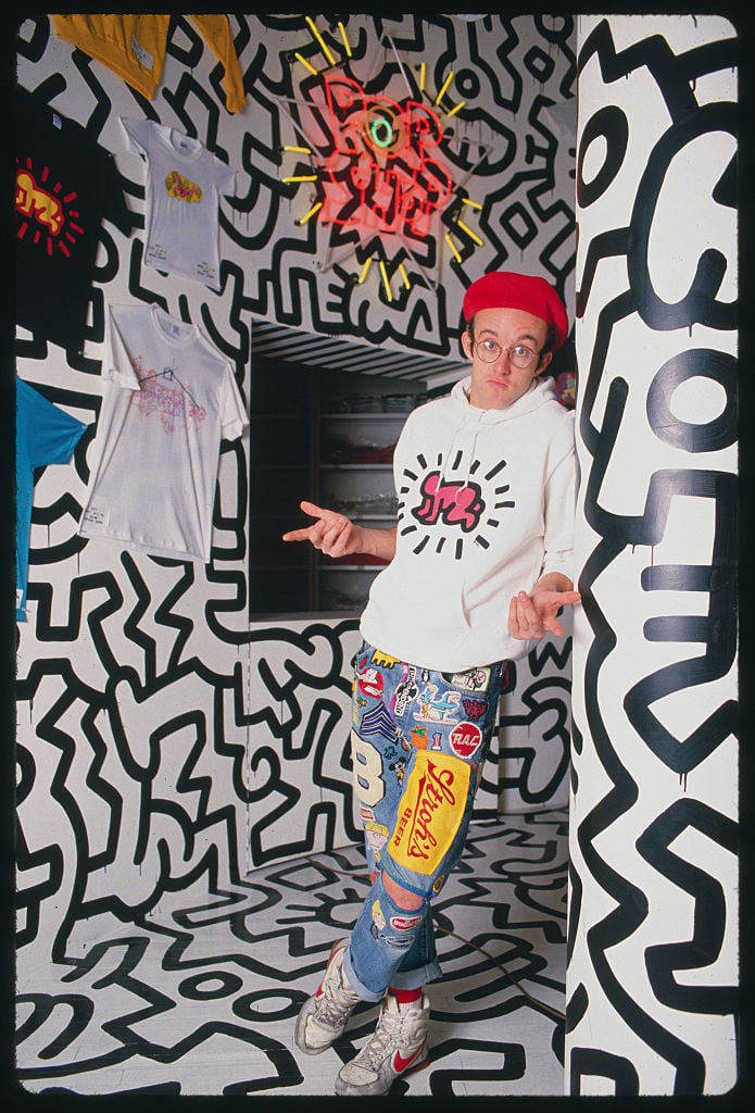 Keith Haring poses at the opening of his Pop Shop. Photo: Nick Elgar / Corbis / VCG via Getty Images.