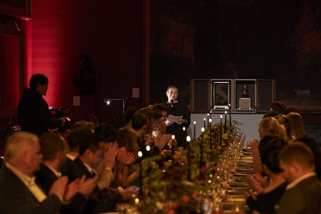 Kate MccGwire speaks at her grand banquet. Royal Salute hosted a dinner for Kate MccGwire at the renowned Tate Gallery. Photo by Danny J. Peace.