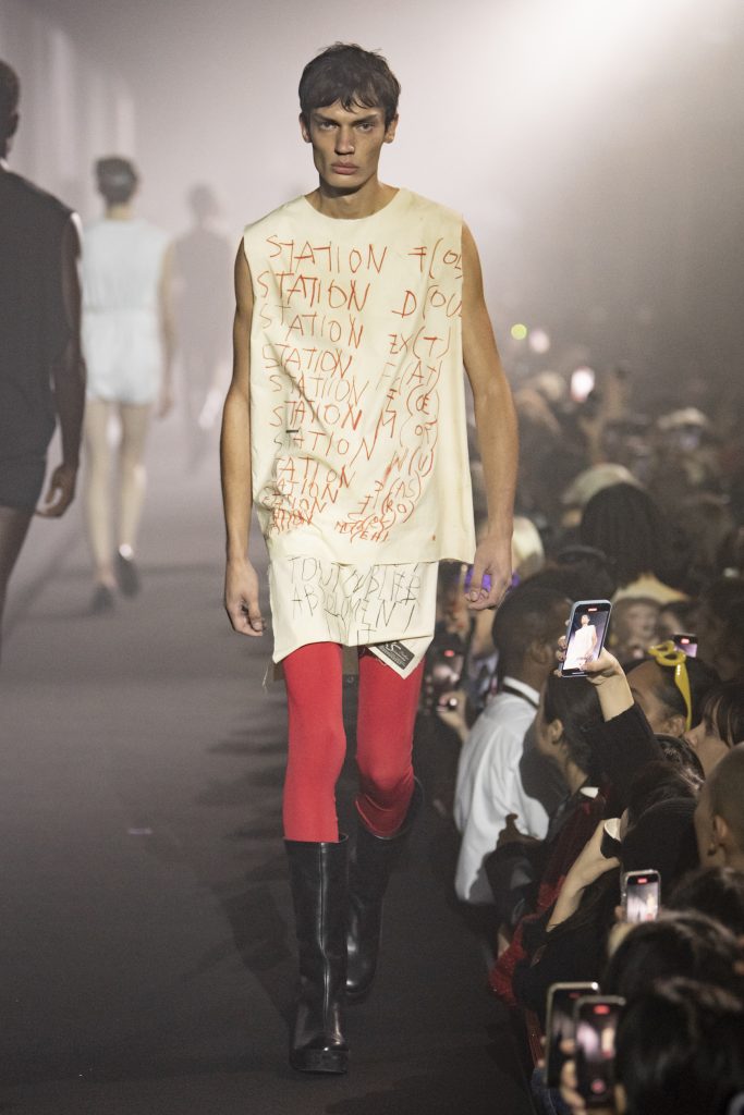 Raf Simons collaborated with the estate of Belgian artist Philippe Vandenberg, whose text-based works adorned tee shirts and dresses. Courtesy of Raf Simons.