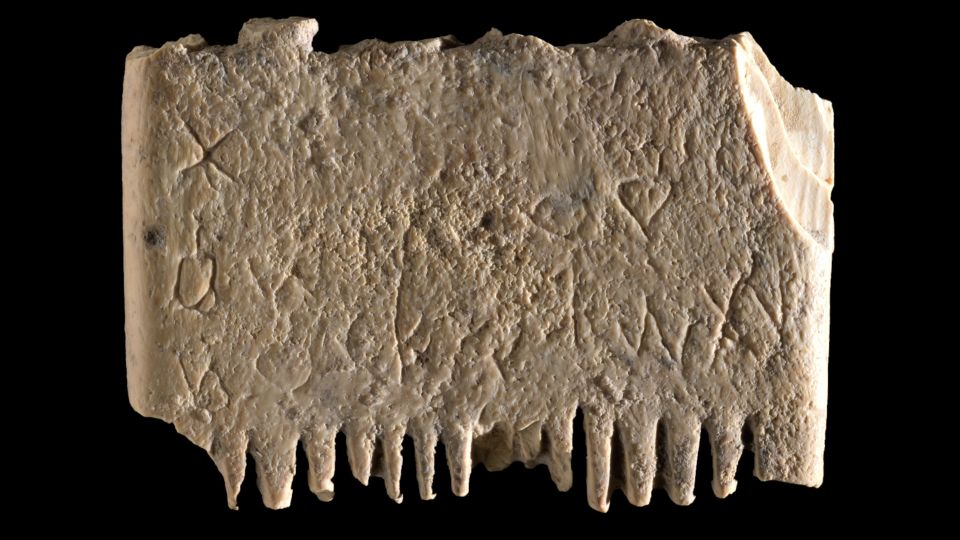 This ancient ivory comb, dated to 1,700 B.C.E., bears an inscription in the Canaanite that is the oldest known sentence written using an alphabet. Photo by Dafna Gazit, courtesy of the Israel Antiquities Authority.