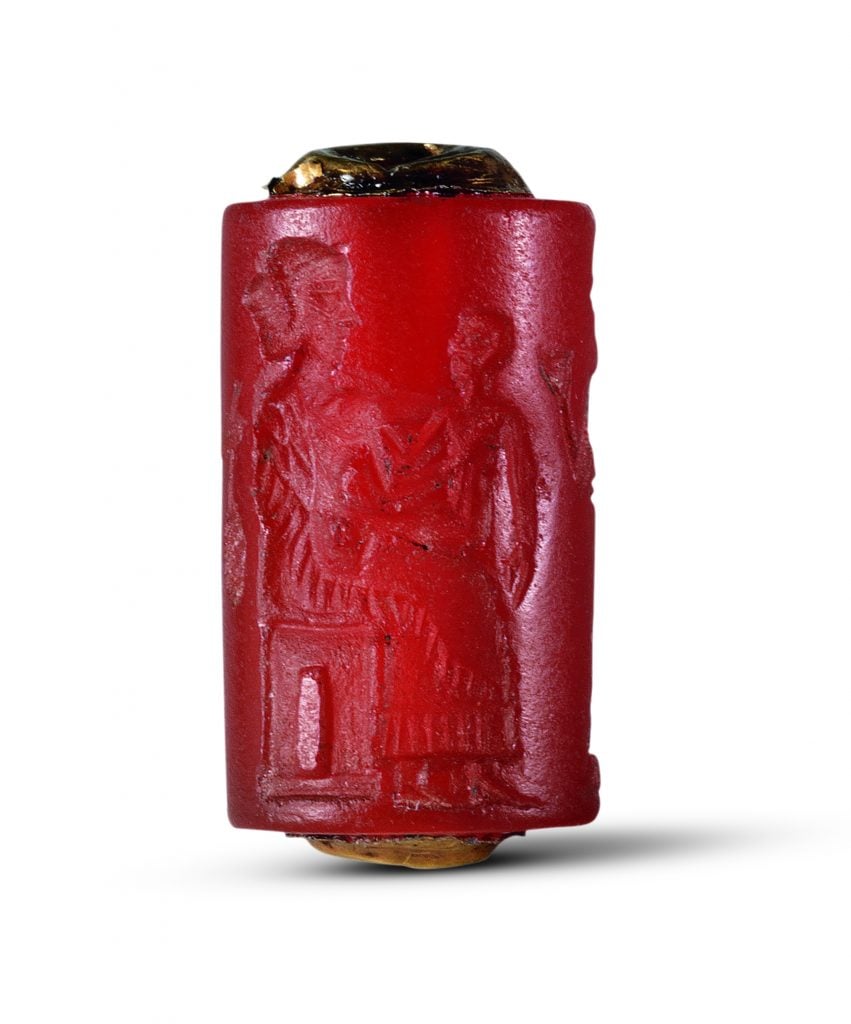 Cylinder seal with mother and child attended by women Mesopotamia, Akkadian, Ur (modern Tell el-Muqayyar), PG 871 Akkadian period (ca. 2,334–2,154 B.C.E.). Photo courtesy of the Penn Museum. 