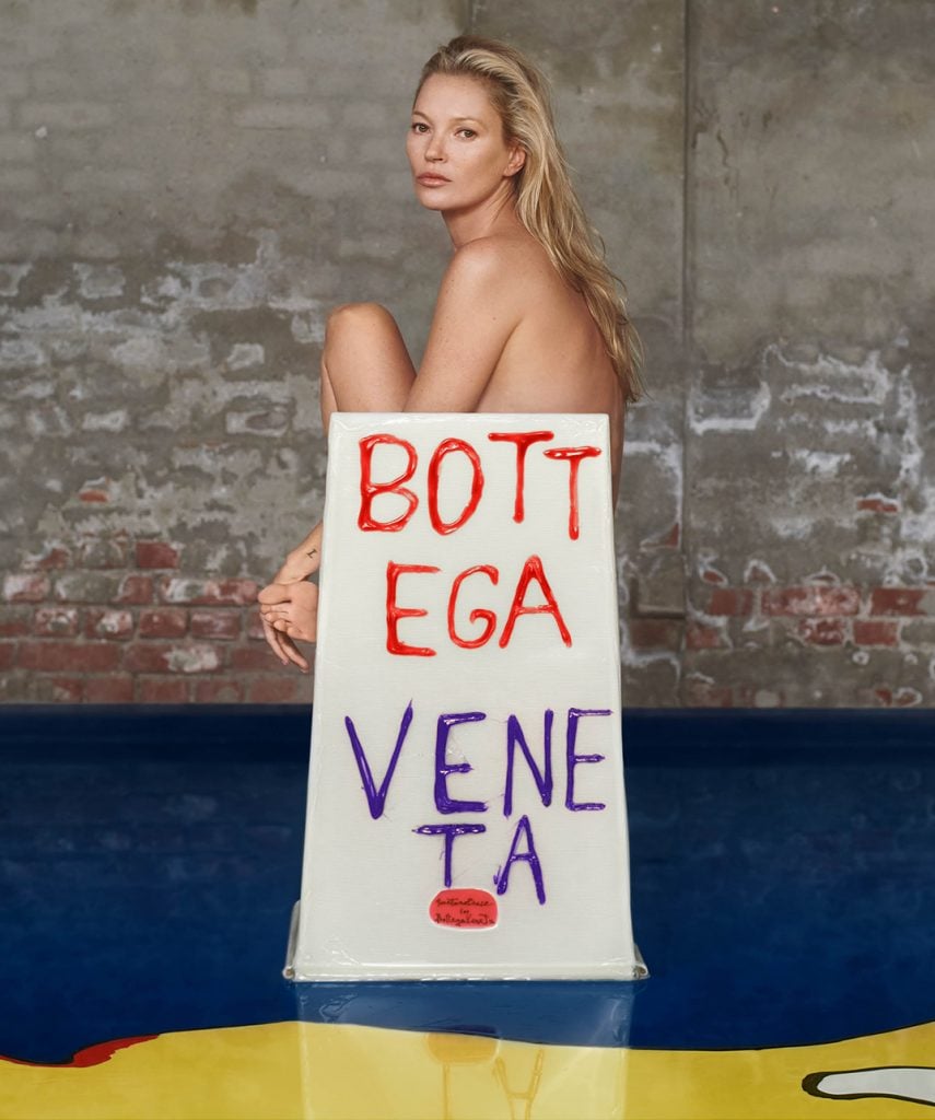 House muse Kate Moss sits on a Gaetano Pesce chair in the latest Matthie Blazy campaign. Courtesy of Bottega Veneta. 