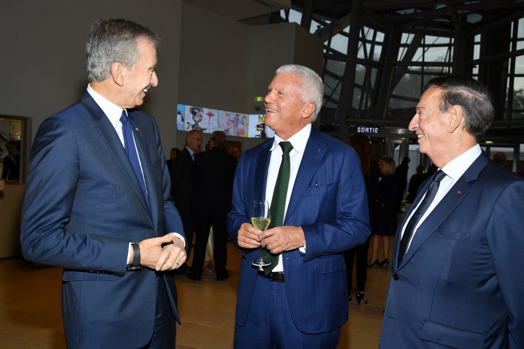 Bernard Arnault, Larry Gagosian, and Jean-Paul Claverie at the Fondation Louis Vuitton on October 1, 2018 in Paris. (Photo by Pascal Le Segretain/Getty Images)