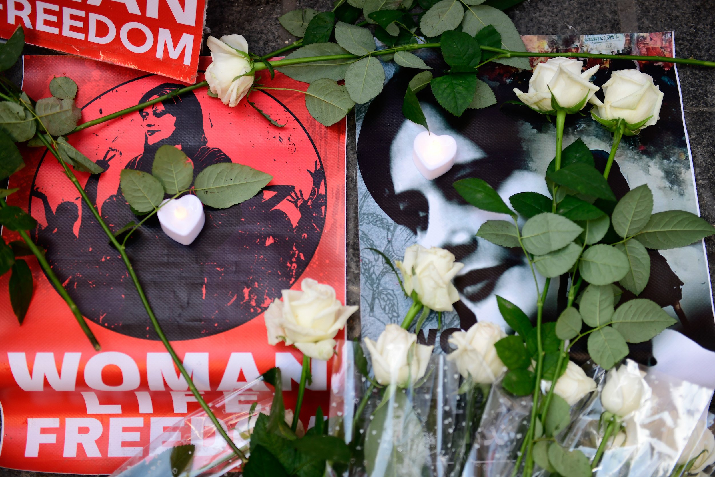 Protests in Iran, which started with the death of 22-year-old Mahsa Amini after being detained on the grounds that she did not comply with the headscarf rules, continue at the Iranian consulate on October 31, 2022 in İstanbul, Turkey. Photo by Omer Kuscu/dia images via Getty Images.