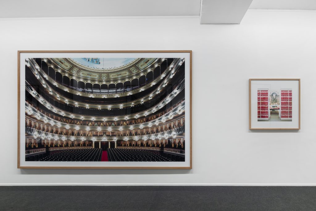 Installation view of "Candida Höffer: Libraries – Churches – Theatres" at Galleri K, Oslo. Left: Teatro Colòn Buenos Aires I (2006). Right: Conway Library London II (2004). Courtesy of Galleri K, Oslo.