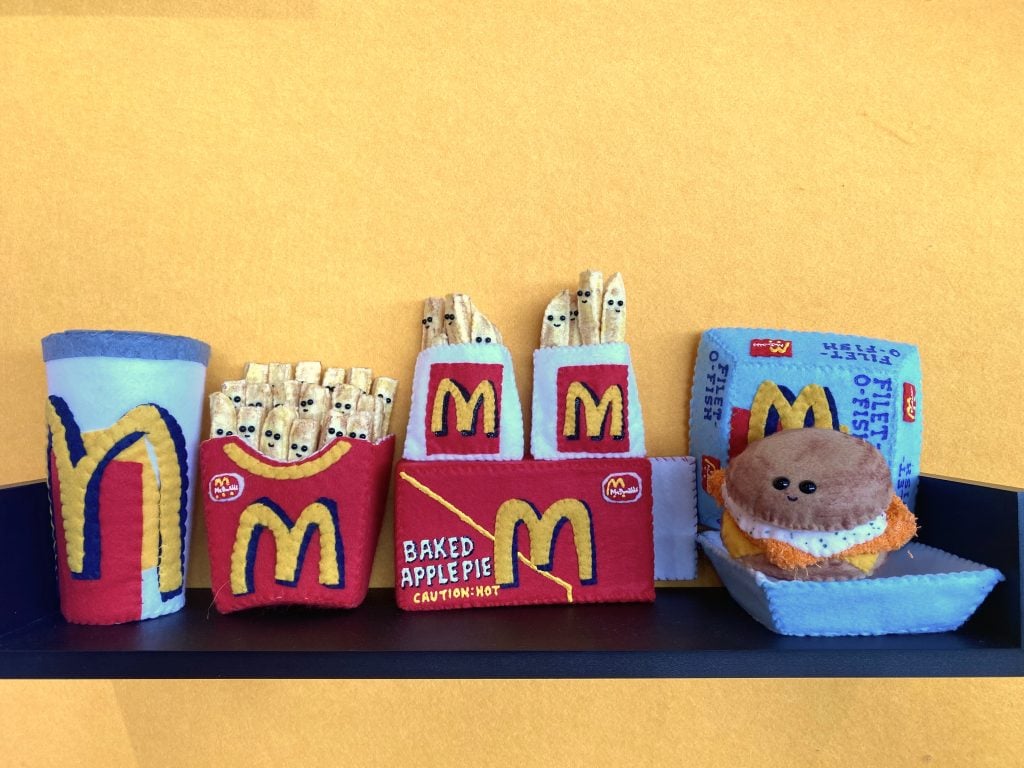 Details from Lucy Sparrow's Mcdonald’s installation at Scope Miami Beach. Photo by Sarah Cascone.