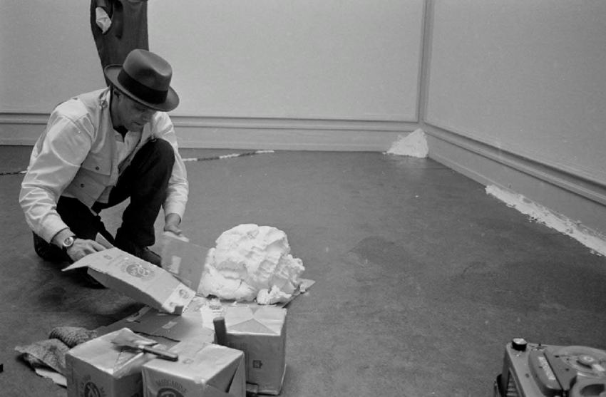Joseph Beuys working on Fettecke (1969). When Attitudes Become Form, Kunsthalle Bern, 1969. Photo: Balthasar Burkhard © J. Paul Getty Trust, Los Angeles, Getty Research Institute (GRI).