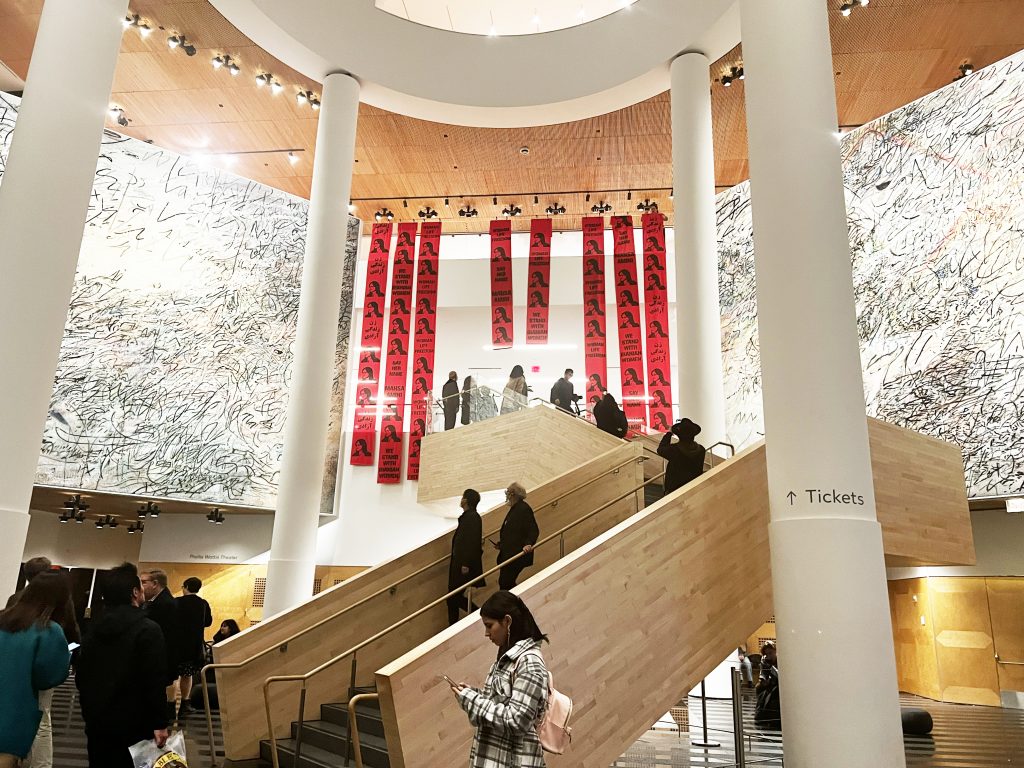 Mahsa Amini banners unfurled at the San Francisco Museum of Modern Art, in support of the Iranian protest movement. Photo courtesy of the anonymous artist protestors.