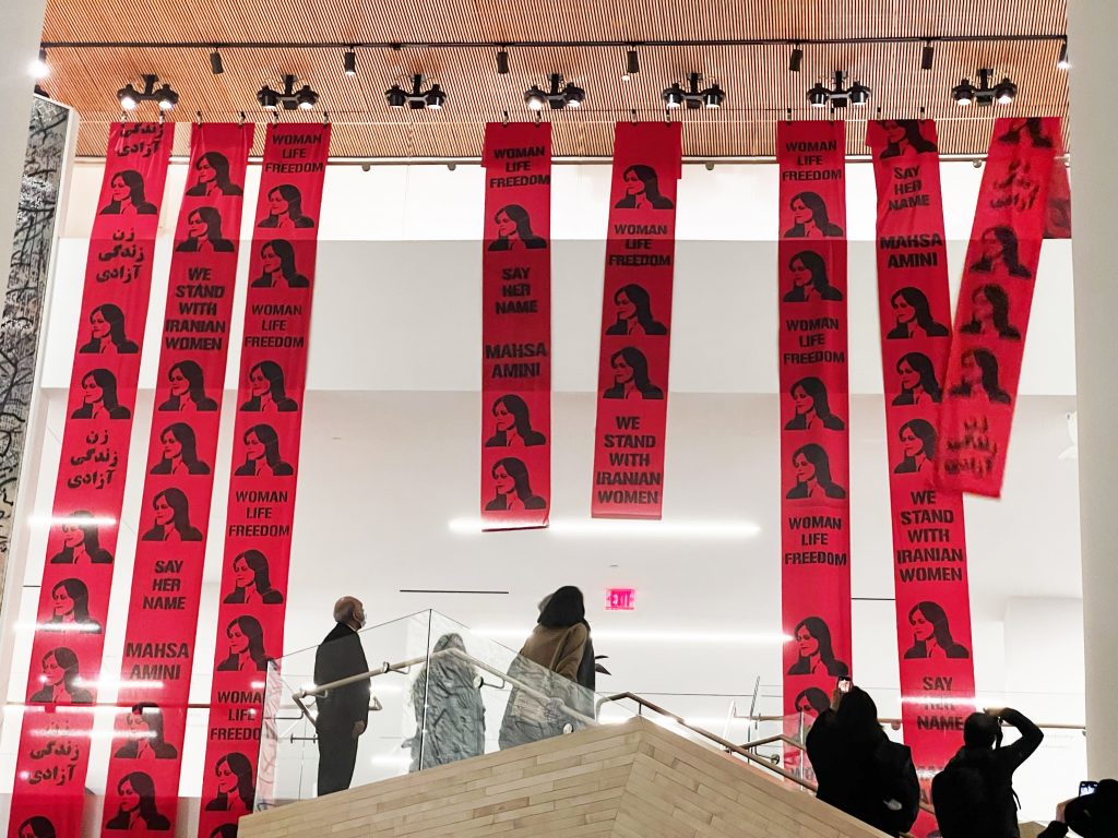 Mahsa Amini banners unfurled at the San Francisco Museum of Modern Art, in support of the Iranian protest movement. Photo courtesy of the anonymous artist protestors. 