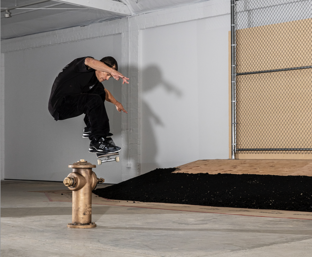 A skateboarder performs an ollie over Danny Minnick's Street Object #1 (Fire Hydrant), installed at Carpenters Workshop Gallery in Los Angeles. Courtesy of the gallery.