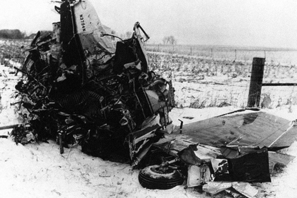 Photo of the wreckage of the aviation accident known as "The Day the Music Died" that occurred on February 3, 1959, near Clear Lake, Iowa, killing rock and roll musicians Buddy Holly, Ritchie Valens, and J. P. "The Big Bopper" Richardson. Photo by the Civil Aeronautics Board, United States Department of Transportation, public domain. 