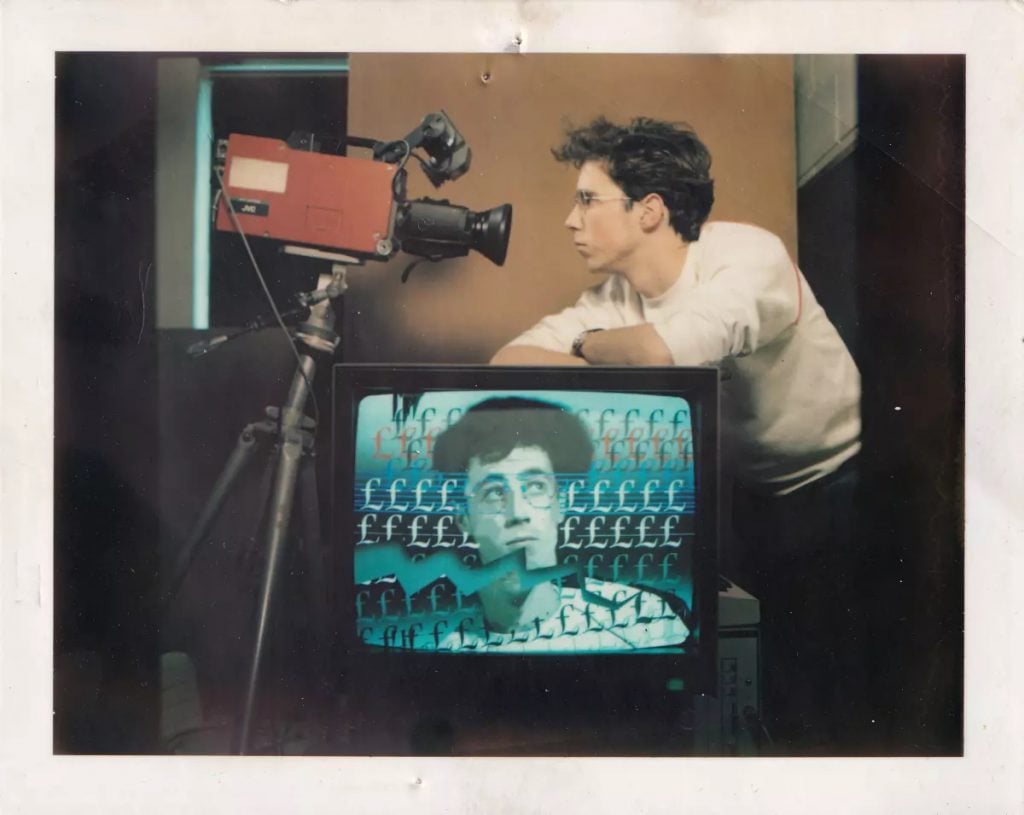 Ian T. Tilton took this photograph of Adrian Wilson with his work on a Quantel Paintbox workstation in 1987. Photo courtesy of the Adrian Wilson Paintbox Archive. 