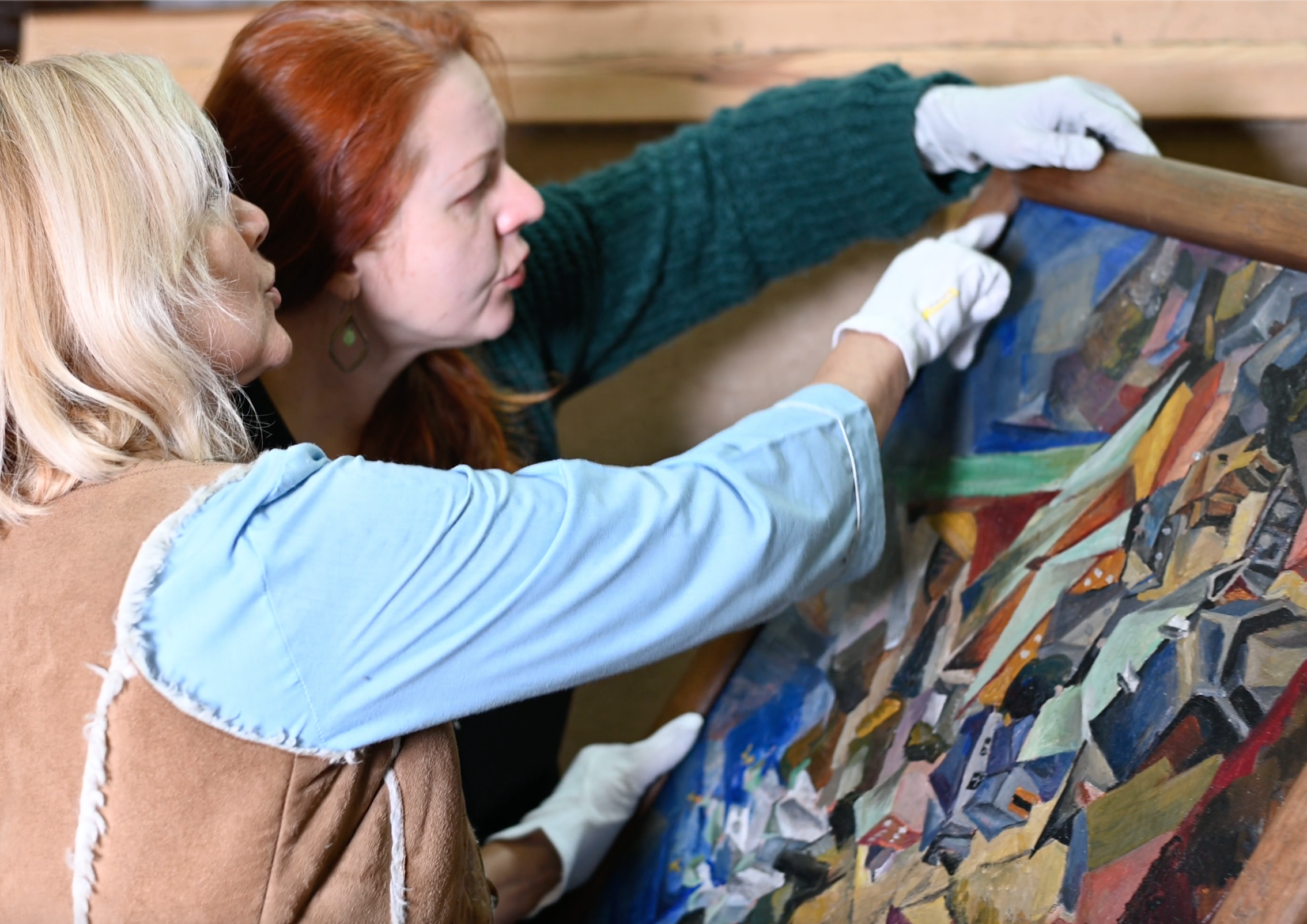 Restorators at the National Art Museum of Ukraine worked on a painting prior to being transported outside of the country. Courtesy of Museums for Ukraine.