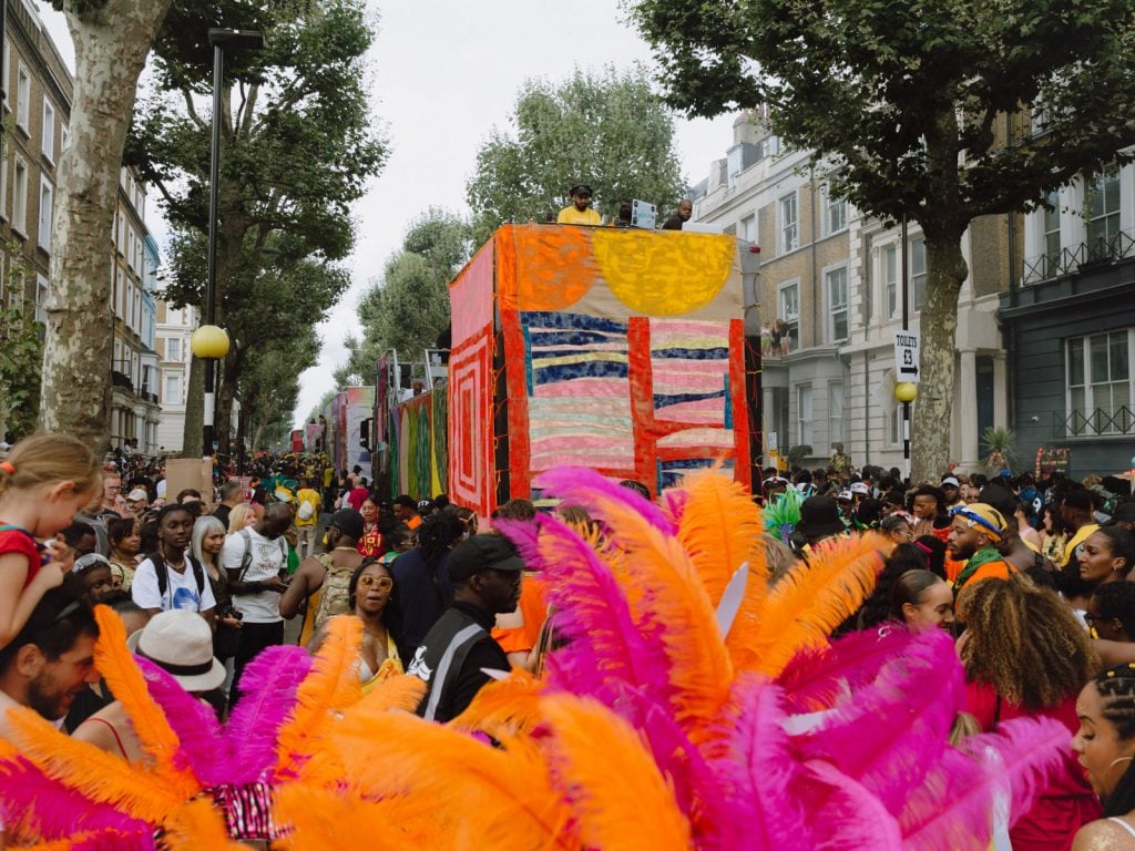This summer, Barrington extended his painting practice to London's Notting Hill Carnival. Photo: Timothy Spurr, © Alvaro Barrington, courtesy the artist and Sadie Coles HQ, London.