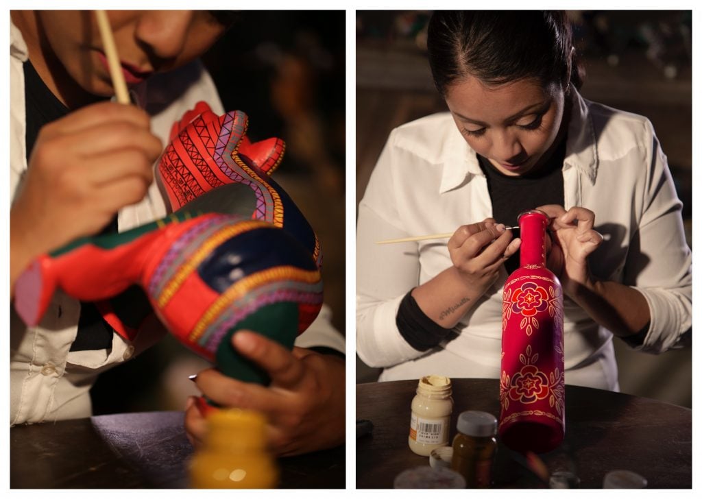 An artisan paints a traditional alebrije and a limited edition bottle. Courtesy of Maestro Dobel. 