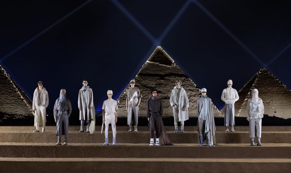 A pantheon of Dior models poses in front of a pyramid in Giza. Photo: Henar Sherif and Adel Essam-min