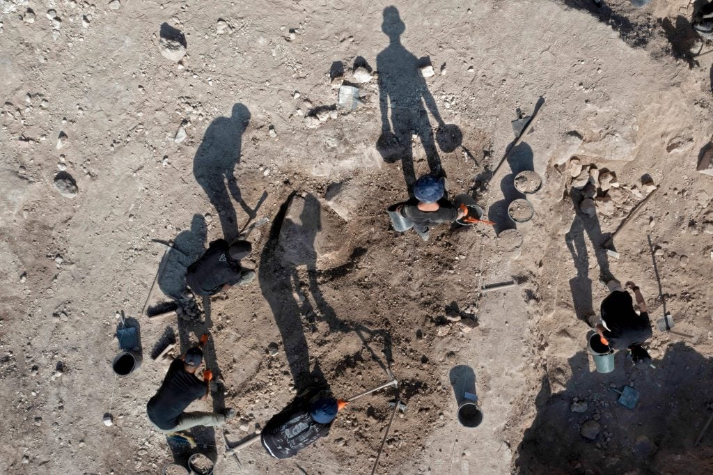 An aerial photo shows Israeli archaeologists working outside the Tomb of Salome. Photo by Menahem Kahana / AFP via Getty Images.