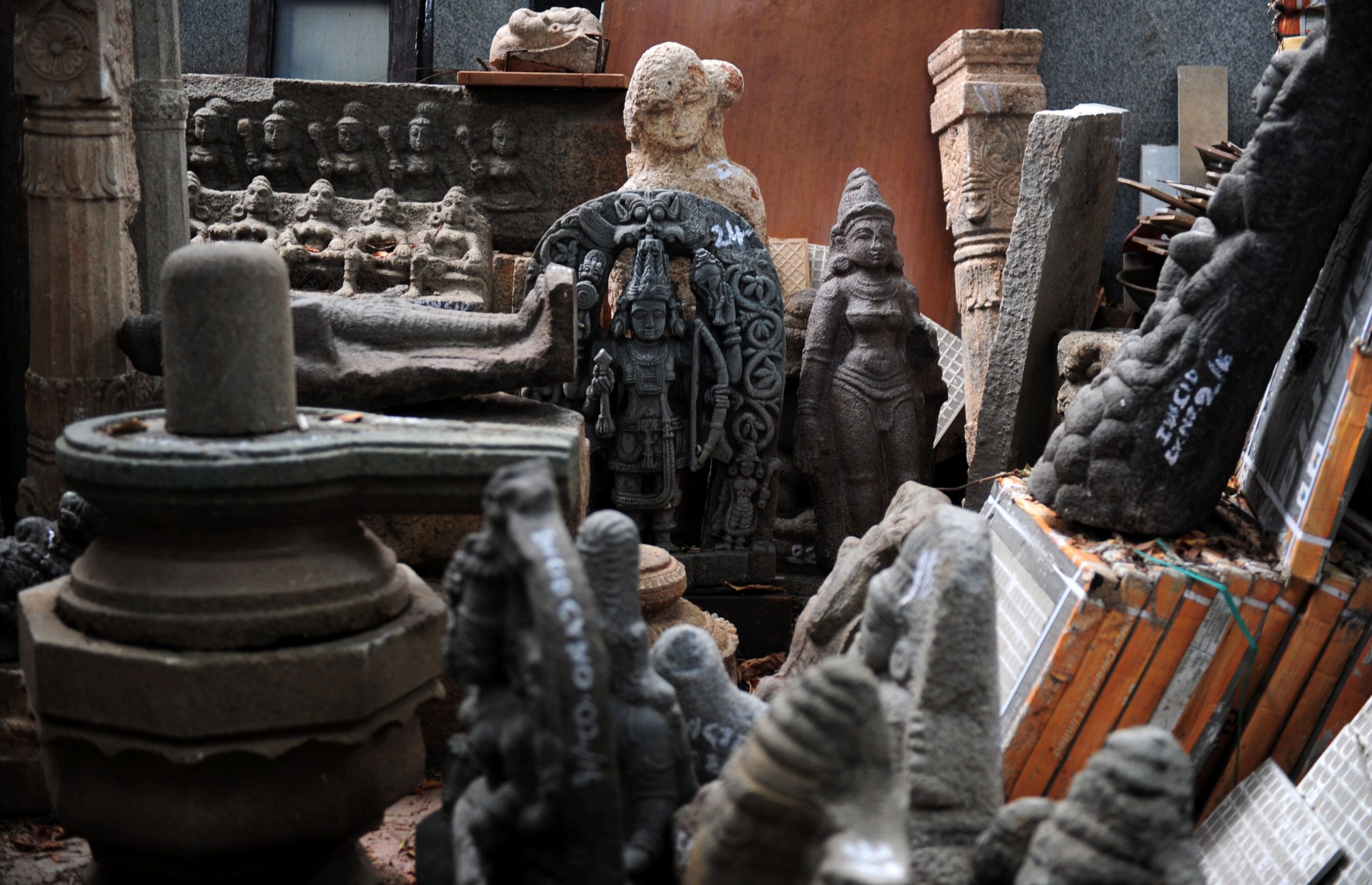 Recovered antique idols and artifacts also thought to have been looted by Deenadayalan, pictured at his home in Chennai on June 22, 2016, following a police raid and his arrest. Photo: Arun Sankar/AFP via Getty Images.