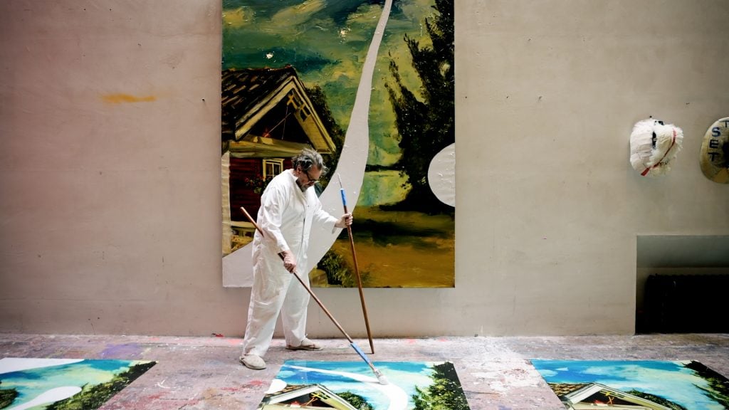 Julian Schnabel in his studio with <i>The Swedish House</i>, edition of 10. Photo: courtesy of Avant Arte