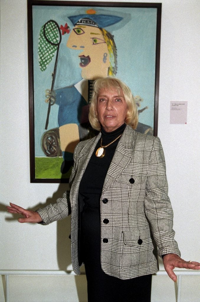 Maya Picasso in front of her portrait in Paris, France on October 15, 1996. Photo: Alain Benainous / Gamma-Rapho via Getty Images.