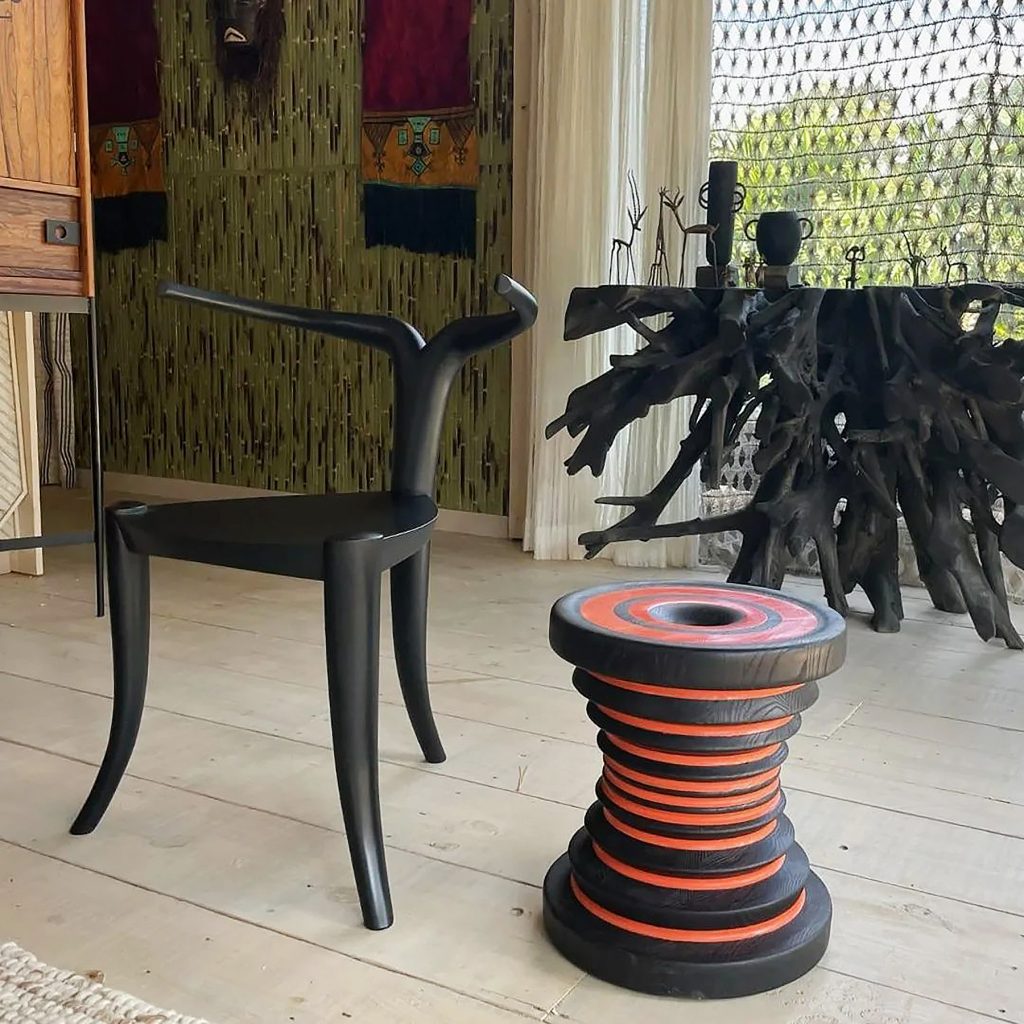 Jomo Tariku's Nyala chair and Mukecha stool on the set of Black Panther: Wakanda Forever. Photo: @jomotariku on Instagram