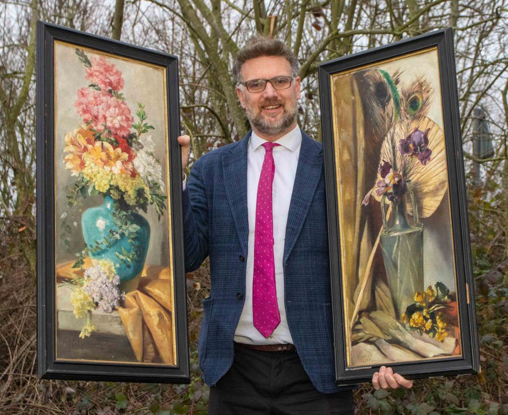 Charles Hanson, owner of Hansons Auctioneers, with Queen Victoria’s paintings. Photo by Mark Laban, courtesy of Hansons Auctioneers.