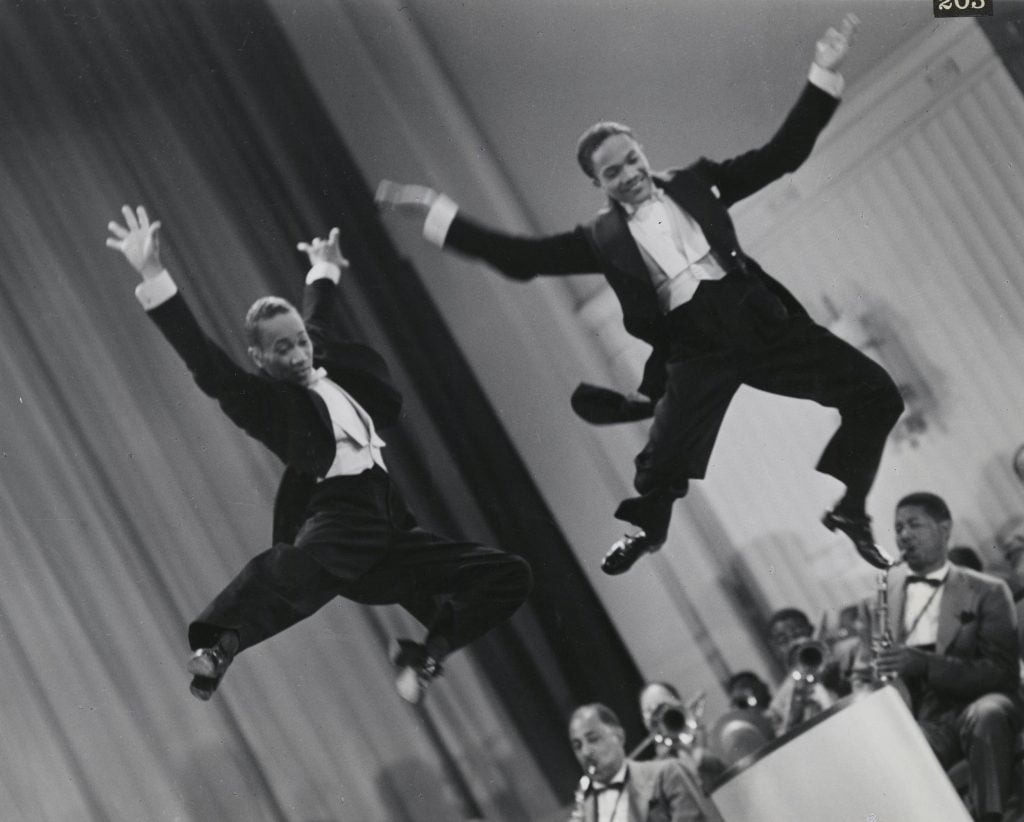 The Nicholas Brothers in a scene from <I>Stormy Weather</I> (1943). Courtesy Margaret Herrick Library ©Twentieth Century Fox.