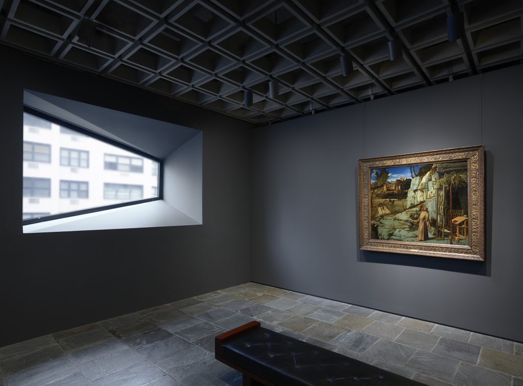 Installation view of Giovanni Bellini, <i>St. Francis in the Desert</i> (late 1470s). Image courtesy The Frick.