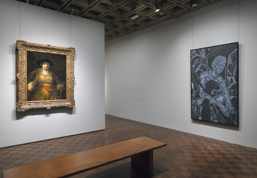 As part of the Living Histories series of installations in 2021-22, Rembrandt's Self-Portrait was shown in conversation with Toyin Ojih Odutola's work <i>The Listener</i> Photo by Joseph Coscia Jr. Image courtesy The Frick.
