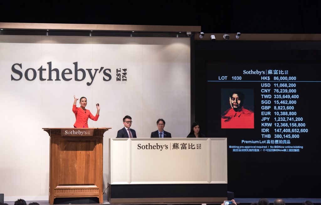 Andy Warhol's screen print <i>Mao</i> sells for HK$86 million ($11 million) at Sotheby's Hong Kong auction on April 02, 2017. Photo by Jayne Russell/Anadolu Agency/Getty Images)
