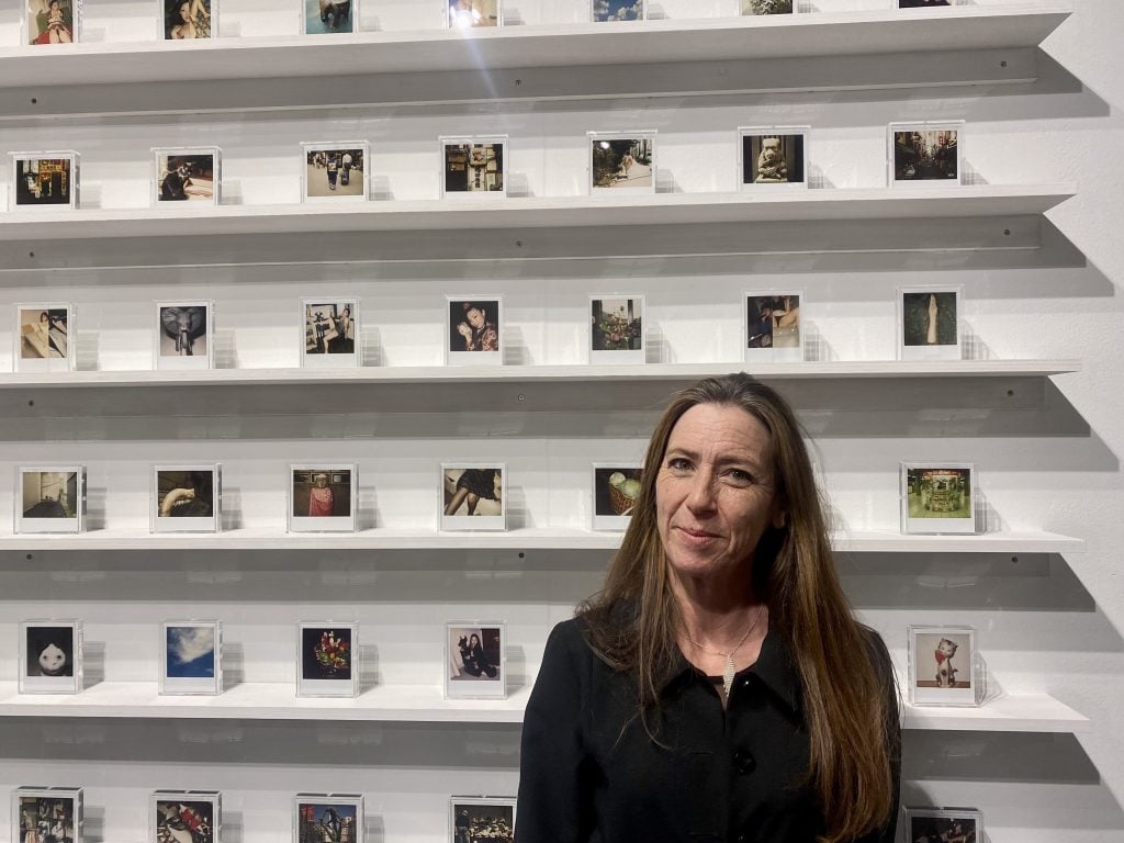 Art publicist Wendy Norris, of San Francisco's Minnesota Street Project, purchased one of the $800 Polaroids by Nobuyoshi Araki and Daido Moriyama, on offer at FOG Design and Art by San Francisco gallery Ratio 3. Photo by Sarah Cascone.