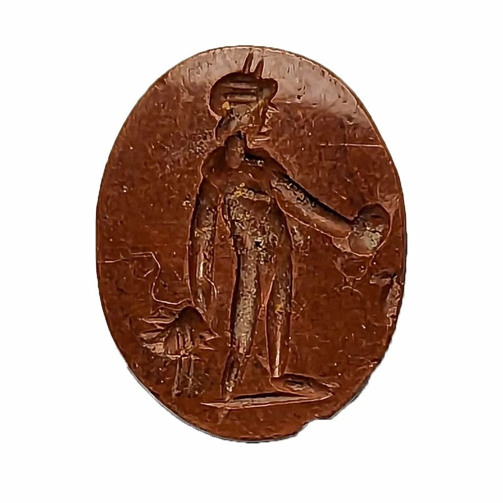 Red jasper intaglio showing Bonus Eventus holding two ears of wheat and a patera. Photo by Anna Giecco.